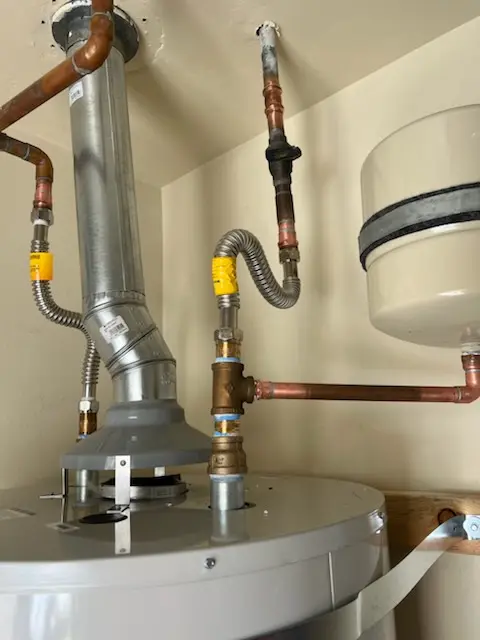 Water heater installation and plumbing repair in The Woods at Colony Crossing